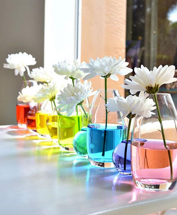 Rainbow Water Centerpiece. Rainbow colors are perfect for a festive event, from kids or adult birthdays to anniversaries or graduation. 