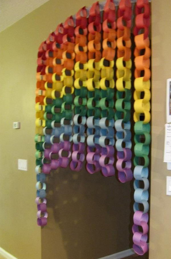 DIY Rainbow Paper Curtain. Rainbow colors are perfect for a festive event, from kids or adult birthdays to anniversaries or graduation. 