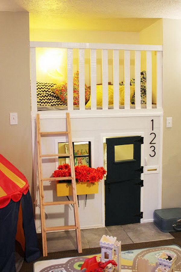 Playhouse built in a fireplace nook. Great idea to bring the fun indoors. 