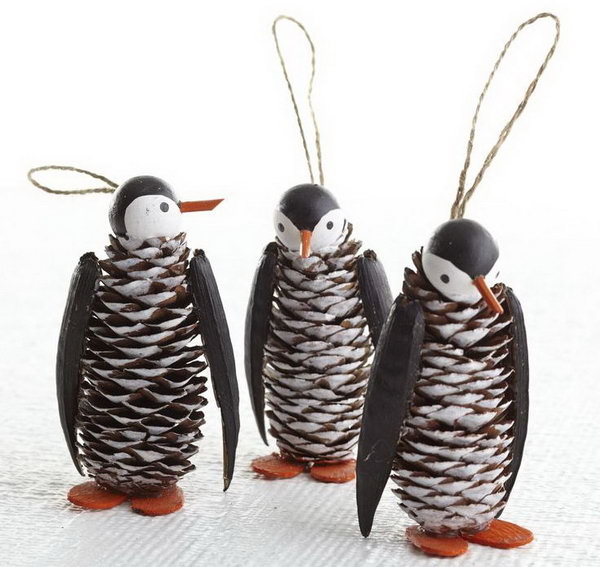 Pinecone penguin with a wooden ball for the head, bamboo skewer for the beak and pine cone body, 