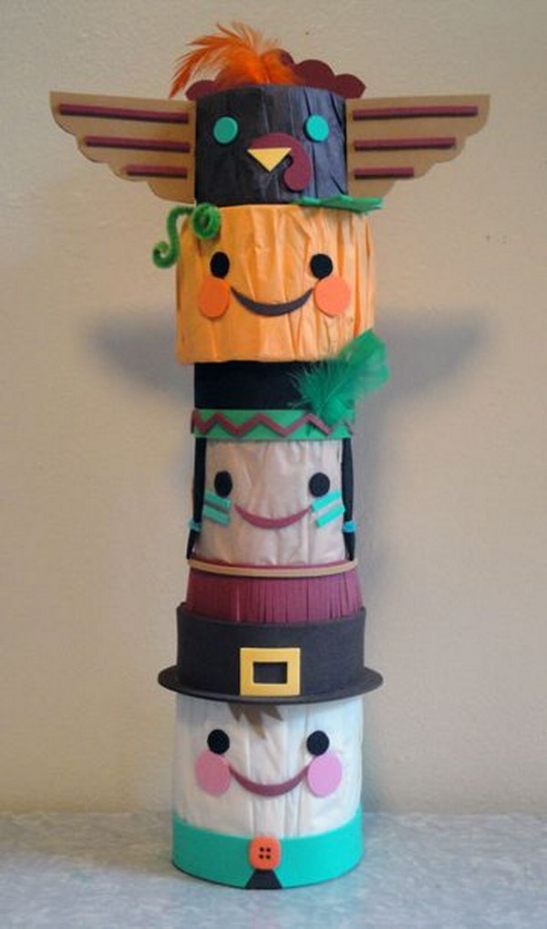This Thanksgiving totem pole craft is made from empty food cans covered in tissue paper and decorated with cut craft foam and feathers. 