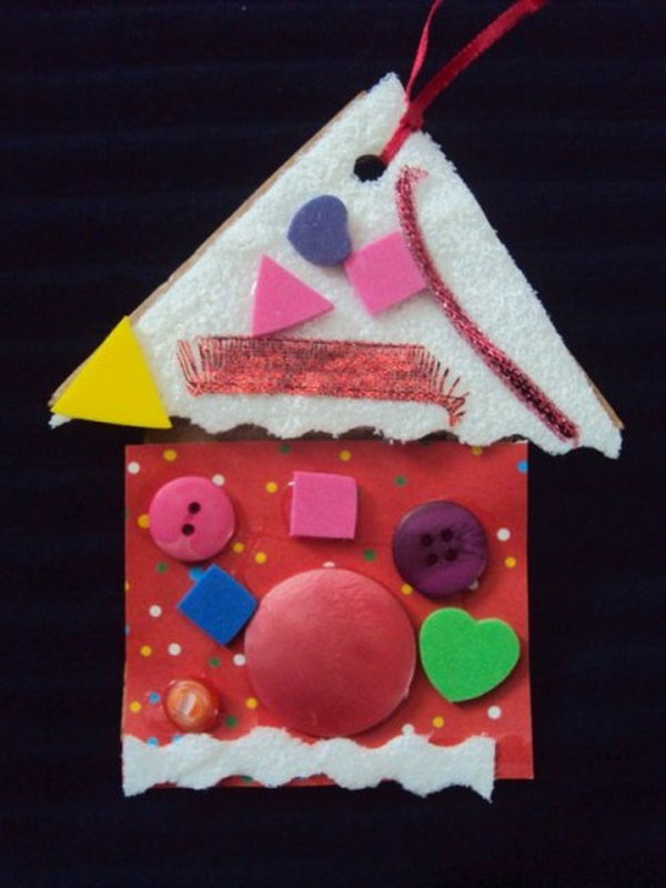 Cut a house shape from cardboard and cover with colourful paper or fabric for a Christmas ornament. 