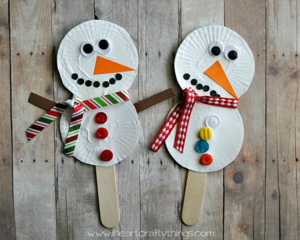 Use white heavy cardstock paper, stick, ribbon, googly eyes and buttons to create a snowman stick puppet. 