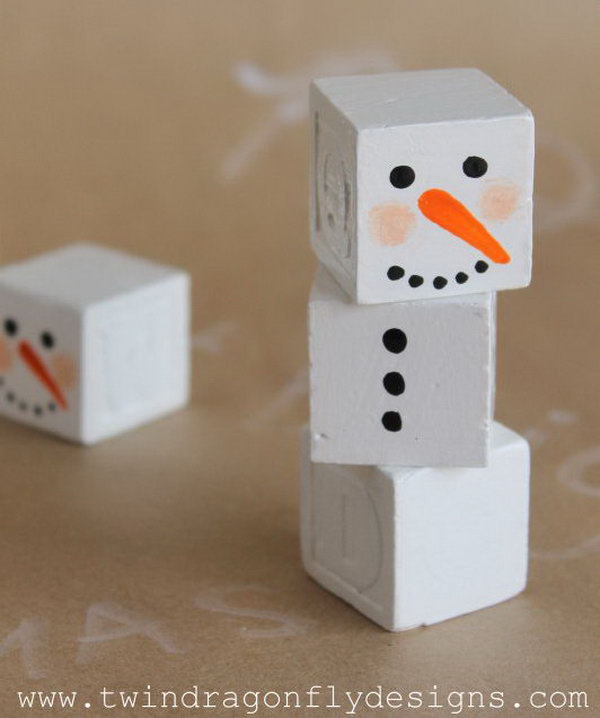 Paint these alphabet blocks to create snowman. add a scarf with a bit of scrap fabric, add a little top hat or toque, add stick arms with a bit of hot glue. 