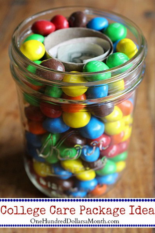 The care packages don’t need to be anything fancy, but just a little something fun and usable to let her know you are thinking about her. What’s more fun and usable than M&M’s and money? 