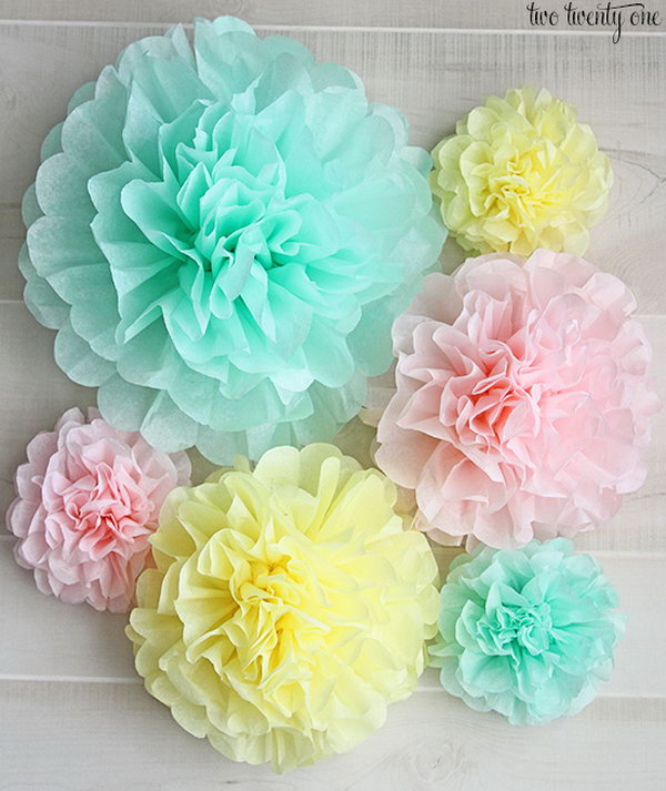 This tissue paper pom poms can be used for a gender reveal party or decorating a girl's room. 