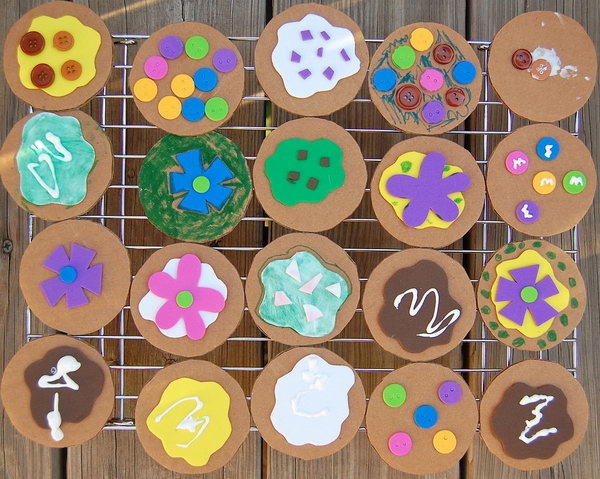 Cardboard Cookies for Dramatic Play Center. Decorate the cardboard circles with various craft supplies. Kids enjoy making them and opening up a cookie shop to sell them. So easy and fun. 