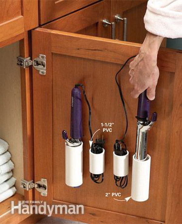 PVC pipe storage for curling irons and cords. Avoid the messy look of curling irons lying on the vanity or the toilet tank. 