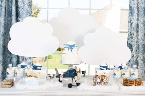 Vintage plane themed birthday parties are popular for boys. This party is built upon a blue and white color scheme that gives the party very clean and friendly look. 