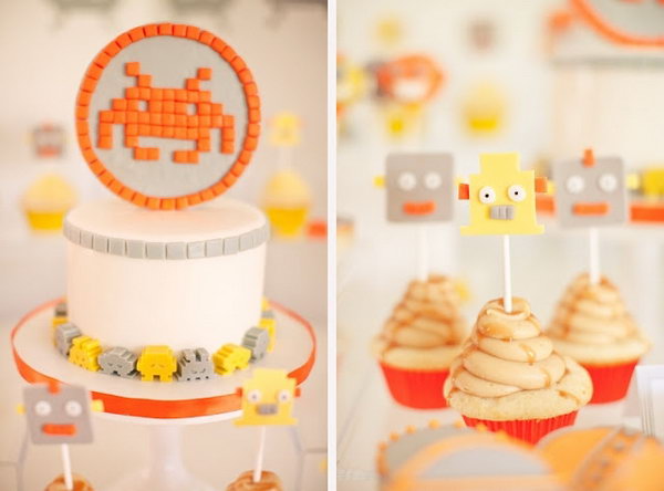 This cheery yellow, orange and grey space invaders themed birthday party was deeply impressive. Even the flower arrangements wear antennas! And they were so cute. 