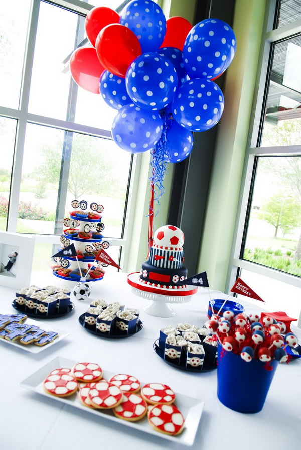 Boys usually love soccer. This party has lots and lots of soccers: cute soccer lollipops, three layer cake with a big soccer topper, soccer bags, cute soccer tags, soccer shaped crackers. 