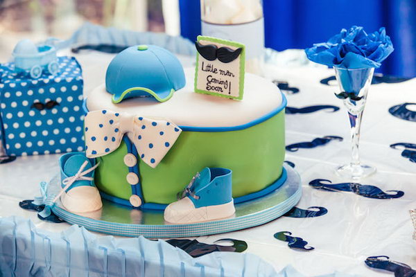 How cute is this little man mustache themed party! Look at the darling Little Man cake, all of the fabulous mustache banners and decor, the cute mustache table cover combined with a ruffled blue table cover, the cute favor bags with mustaches on them and MORE! 