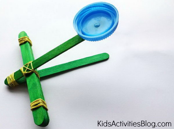 Craft Stick Catapult. This is the easiest one to make. It doesn't take you much time and materials, just with craft sticks, rubber bands, a milk cap, cotton balls. Learn how to do it. 