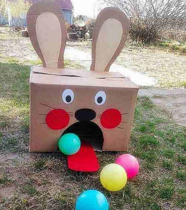 Easter Bunny Ball Toss Activity. Use a huge carton box and make it into the Easter bunny shape. Leave a big fan shaped hole and glue its tongue from red painted cardboard. Stand five feet from the Easter Bunny carton and throw colorful balls toward it. Count how many balls you can throw in. 