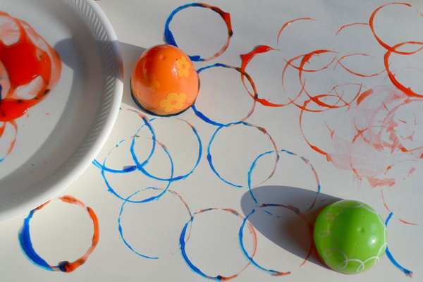 Circle Prints Easter Activity. Use the half Easter egg to dip the paint in a paper plate. Press colorful circles on paper. You can get this artistic painting easily. 