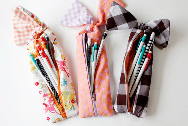 Adorable Bow Pencil Pouch. Sew the lining and main pieces together, insert the zipper and make the bows on the bottom. You'll complete this adorable bow pencil pouch in this beautiful design to pack your pencils. 