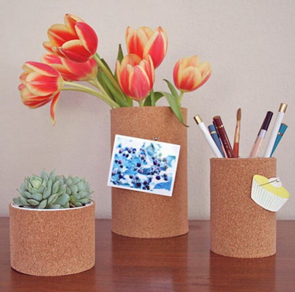 Cork Pencil Holders. Spray paint inside of each can, roll out cork and add thick bead at the end of the roll then pin with clothes pins. Place everything you dream up to get them organized. It's super chic to add some flowers and plants for a fresh decor. 