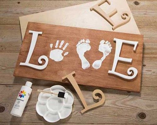 Love Sign Art with Child’s Prints. 