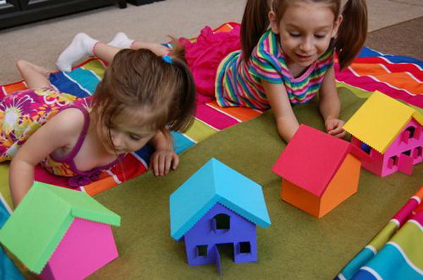 Build  Rainbow Village. Use your free colorful cardstocks to make this rainbow village. Use bits of velcro to hold the houses together. Your kids can  build and re build the rainbow village over and over again with different color combinations. Learn more here. 