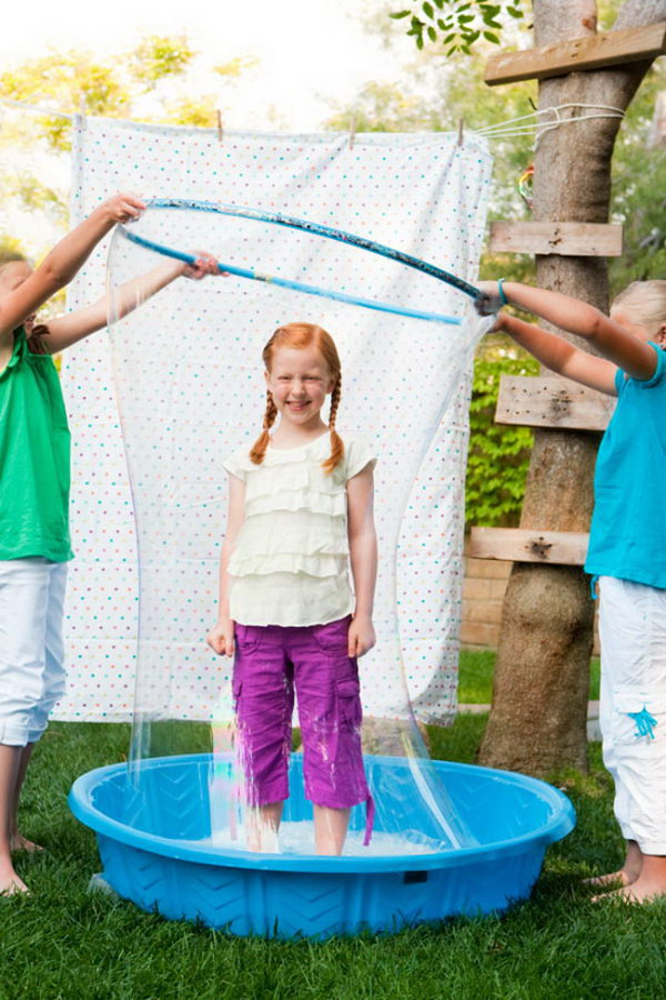 Human Bubble Machine. Have a child stand in the center of the pool. Place the child inside the gigantic bubble with the hula hoop. The kids must like this funny game. 