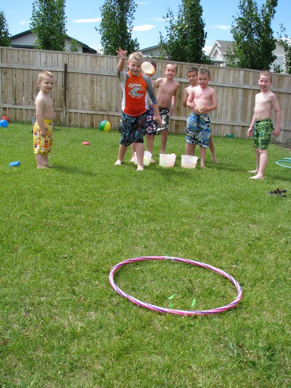 Water Balloon Target Toss. Pull out the hula hoop and toss your water balloons at the target. You can group the players and count how many each team hits the target to raise the team spirit for kids in this funny game. 