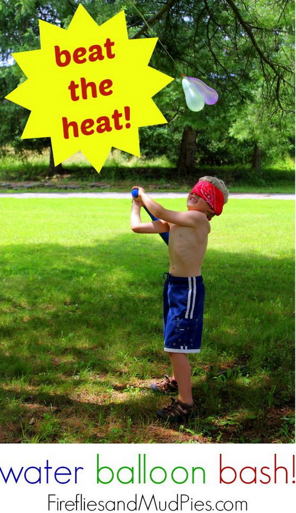 Blind Water Balloon Bash. Hang colorful water balloons on a line. Use opaque cloth to cover the eyes of the kids. Ask the kids to hit the water balloon with a stick. The one who bats the most win this game. It's funny and interesting for the kids to beat the heat off. 