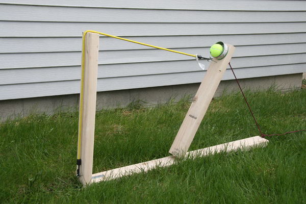 Wooden Catapult Water Balloon Launcher. Create the base, attach the can to throw, eye bolts and attach the rope and bungee cord to finish off this balloon launcher. It's easy yet can launch your water balloon quickly. 