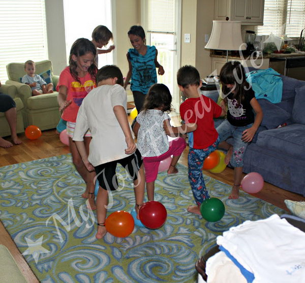 Balloon Stomp. Players run around in the designated area and try to pop the other players’ balloons by stomping on them and also try to keep their own balloon from being popped. The player with the last unpopped balloon is the winner. Balloons,  some string or yarn are all you need for this activity. 