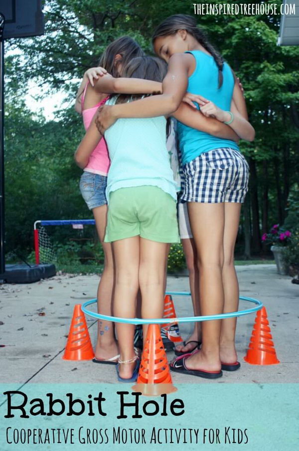 Rabbit Hole Team Building Activity. Children pack themselves into a tight circle and move around inside the hula hoop without dropping down the cones or other objects, which are used to prop the hula hoop off the ground. Imagination is the key in this challenge. This is a great activity to teach kids about personal space and build teamwork. Get more details 