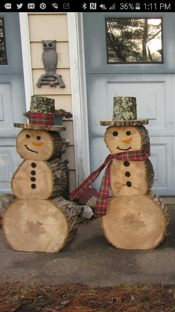 Snowmen Made Out of Recycled Logs in Your Yard. 