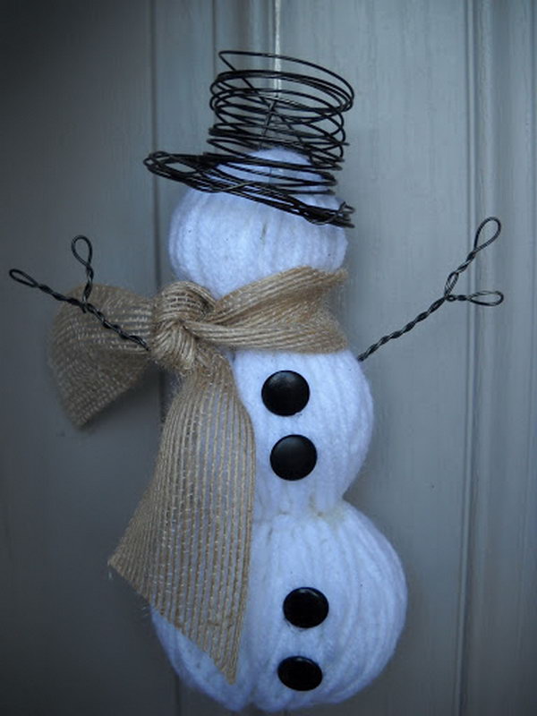 Snowman Craft Made out of Yarn Wrapped Foam Balls. 