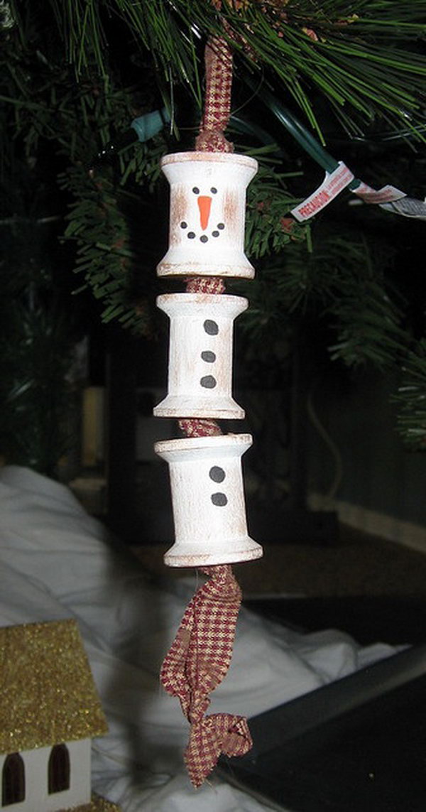 wooden spool snowman ornament. 