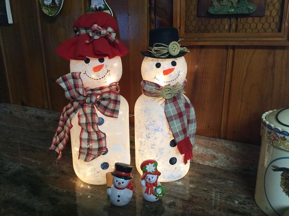 Snowmen Crafts Made out of Large Pickle Jars and Light Globes. 